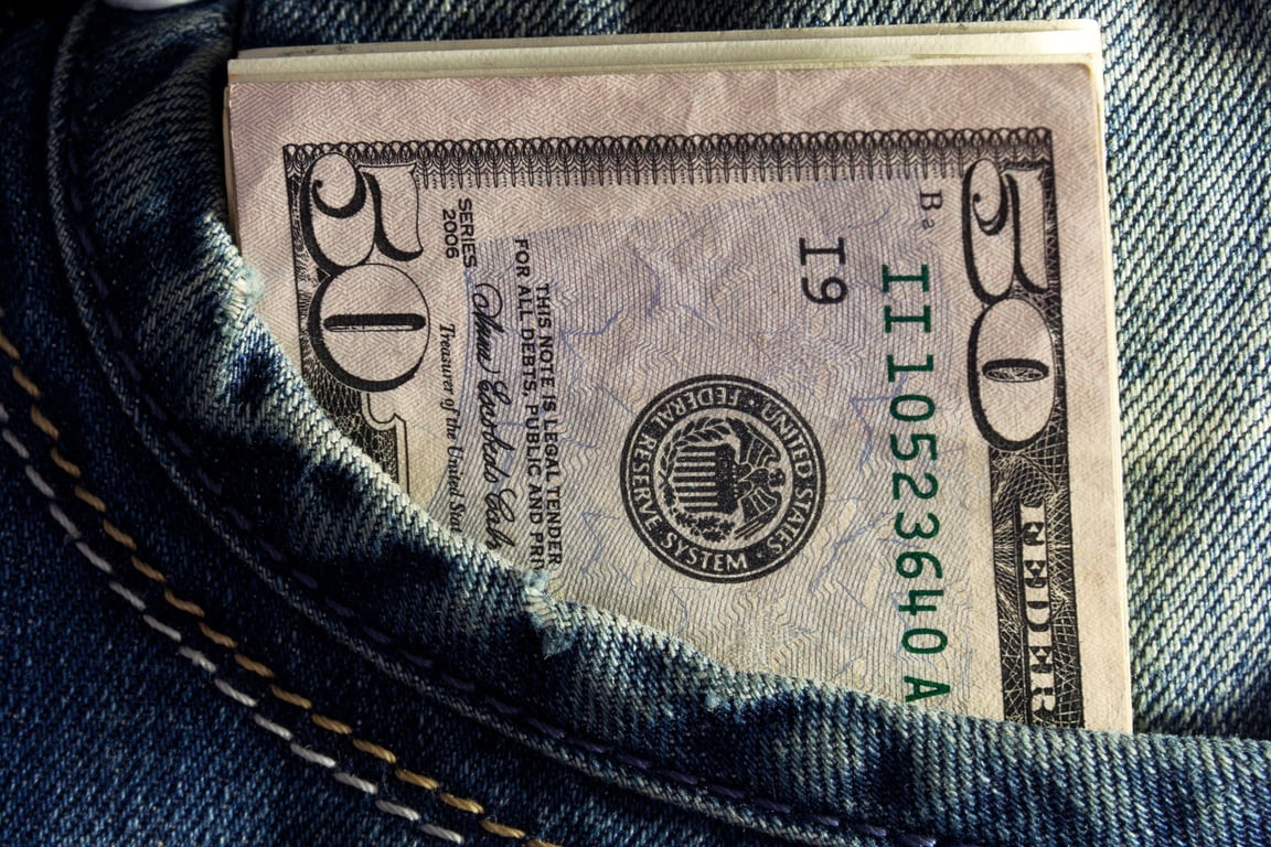 Money in a Persons Pocket